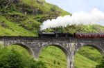 Steam Train On Glenfinnan Viaduct, Known From Harry Potter Stock Photo