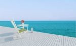Beach Lounges With Sundeck On Sea View For Vacation And Summer-3 Stock Photo