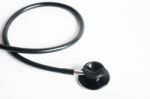 Black Stethoscope On White Background Stock Photo