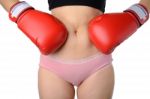 Woman With The Boxing Gloves Fight With Her Belly, Diet Concept Stock Photo