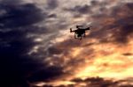 Drone Flying During Sunset Stock Photo