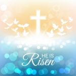 Shining And Birds With He Is Risen Text For Easter Day Stock Photo