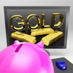 Gold Screen Shows Wealth And Financial Treasure Stock Photo