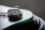 Antique Pocket Watch On Glass Table Stock Photo
