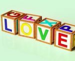 Love Blocks Show Romance Affection And Devotion Stock Photo