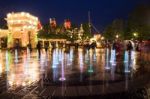 People Visit Night Music Fountain In Disney Sea Stock Photo
