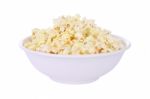 Popcorn In Round Bowl On White Background Stock Photo