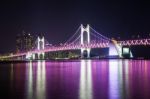 Gwangan Bridge And Haeundae At Night In Busan,korea Stock Photo