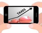 Taxes Arrow Displays Higher Taxation And Levies Stock Photo