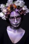 Halloween Girl With Rhinestones And Wreath Of Flowers Stock Photo