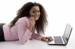 Student With Laptop And Magnifier Stock Photo