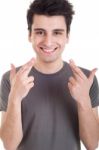 Man With Crossed Fingers Stock Photo