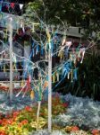 Colourful Looms And Ribbons On Artificial Trees In East Grinstea Stock Photo