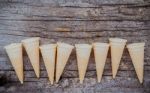 Flat Lay Ice Cream Cones Collection On Shabby Wooden Background Stock Photo
