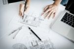 Close-up Of Person's Engineer Hand Drawing Plan On Blue Print Wi Stock Photo