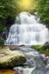 Mun Dang Waterfall In Deep Forest Fresh Green Rain Season In Tha Stock Photo