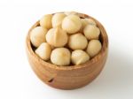 Macadamia Nuts In Wooden Bowl Stock Photo