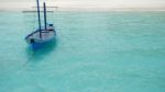 Typical Maldivian Boat On Blue Ocean Stock Photo