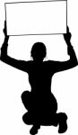 Silhouette lady showing empty board Stock Photo