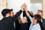 Teamwork - Business People With Joint Hands In The Office Stock Photo