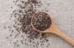 Chia Seeds In Wooden Spoon Stock Photo
