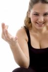 Smiling Girl Showing Hand Gesture Stock Photo