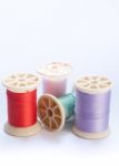 Vintage Grunge Colorful Thread Spool On White Background Stock Photo