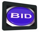 Bid Tablet Shows Online Auction Or Bidding Stock Photo