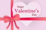 Happy Valentine Day On Heart Shape Paper On Gift Box And Bow - V Stock Photo