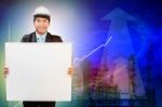 Engineering Man And Empty Broad And Business Graph Stock Photo
