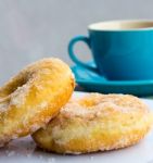 Coffe And Doughnuts Indicates Coffee Cup And Beverages Stock Photo