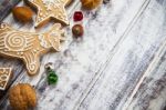 Christmas Gingerbread Cookies On White Table Stock Photo
