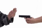 Hands Of Woman And Man With Pistol Stock Photo