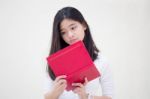 Portrait Of Thai Teen Beautiful Girl Reading Book Stock Photo