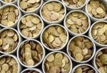 Many Coin Lined In Silver Bowl Stock Photo
