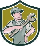 Mechanic Pointing Spanner Wrench Shield Cartoon Stock Photo