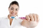 Smiling Female Showing Toothbrush Stock Photo