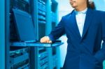 Man Fix Server Network In Data Center Room Stock Photo