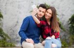Young Couple Using Smart Phone Stock Photo