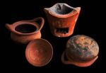 Old Clay Pot On Black Background Stock Photo