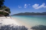 Calm Beach And Clear Blue Sea Stock Photo