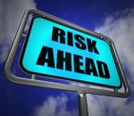 Risk Ahead Signpost Shows Dangerous Unstable And Insecure Warnin Stock Photo