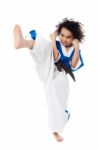 Young Kid Practicing Karate Stock Photo
