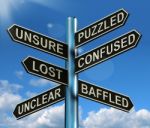 Puzzled Confused Lost Signpost Stock Photo