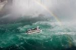 Fantastic Background With The Ship, Rainbow And Niagara Falls Stock Photo