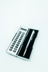 Pocket Box Of Calculator And Pen Isolated On White Background Stock Photo