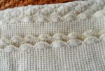 Hand Knitted Baby Cover Stock Photo