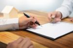 Customer Signing Contract, Agreed Terms And Approved Application Stock Photo
