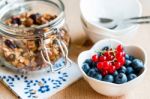 Healthy Breakfast With Granola And Fresh Fruits Stock Photo