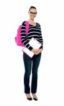 Smiling College Girl Carrying Bag Stock Photo